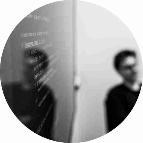 Abstract image of a man and a screen with code